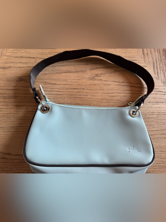 Lacoste Handbags - Early 2000s Lacoste Vintage “Baguette” Baby Blue Shoulder Bag with Black Strap
